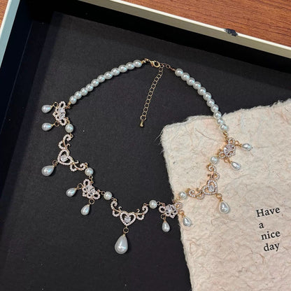 D-0002 Elegant French - Inspired Waterdrop Pearl Necklace with Vintage Charm