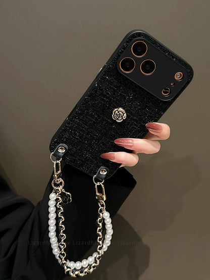A0007-Black Camellia Phone Case with Pearl Rhinestone Chain IPhone Case for iPhone — Compatible with iPhone 17/16/15/14/13 Series (Pro & Pro Max)