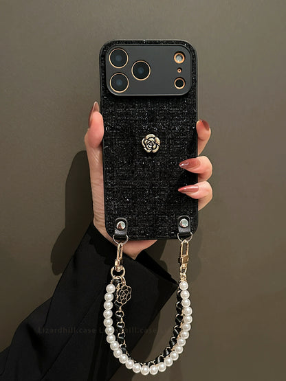 A0007-Black Camellia Phone Case with Pearl Rhinestone Chain IPhone Case for iPhone — Compatible with iPhone 17/16/15/14/13 Series (Pro & Pro Max)
